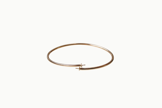 Gold filled flexibele armband met kraalkap en stift